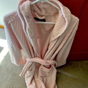Pink fuzzy robe